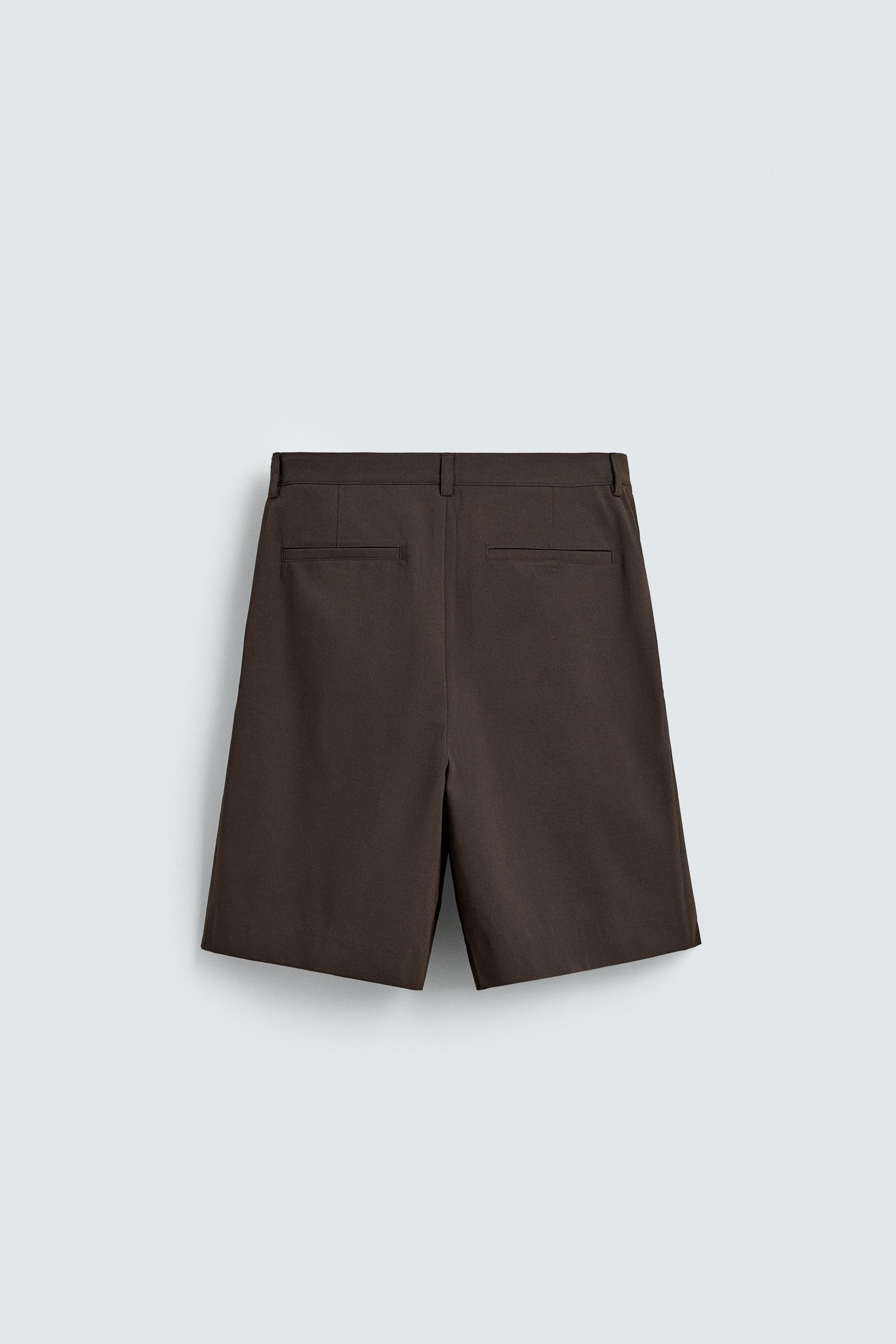 RELAXED FIT PLEATED SHORTS